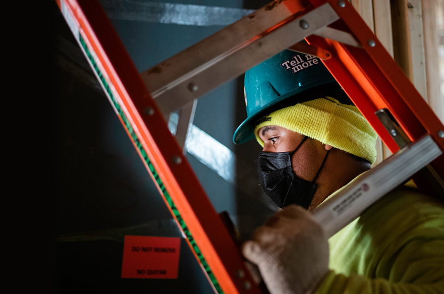 Close up of an insulation contractor